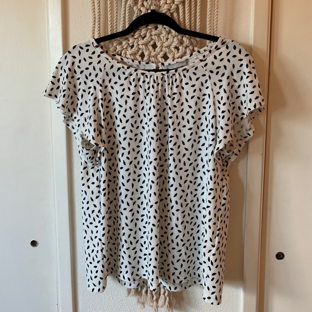 White and black pattered blouse